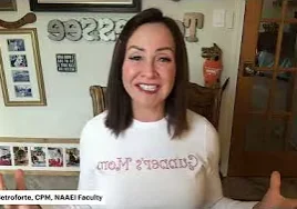 Smiling woman in white shirt